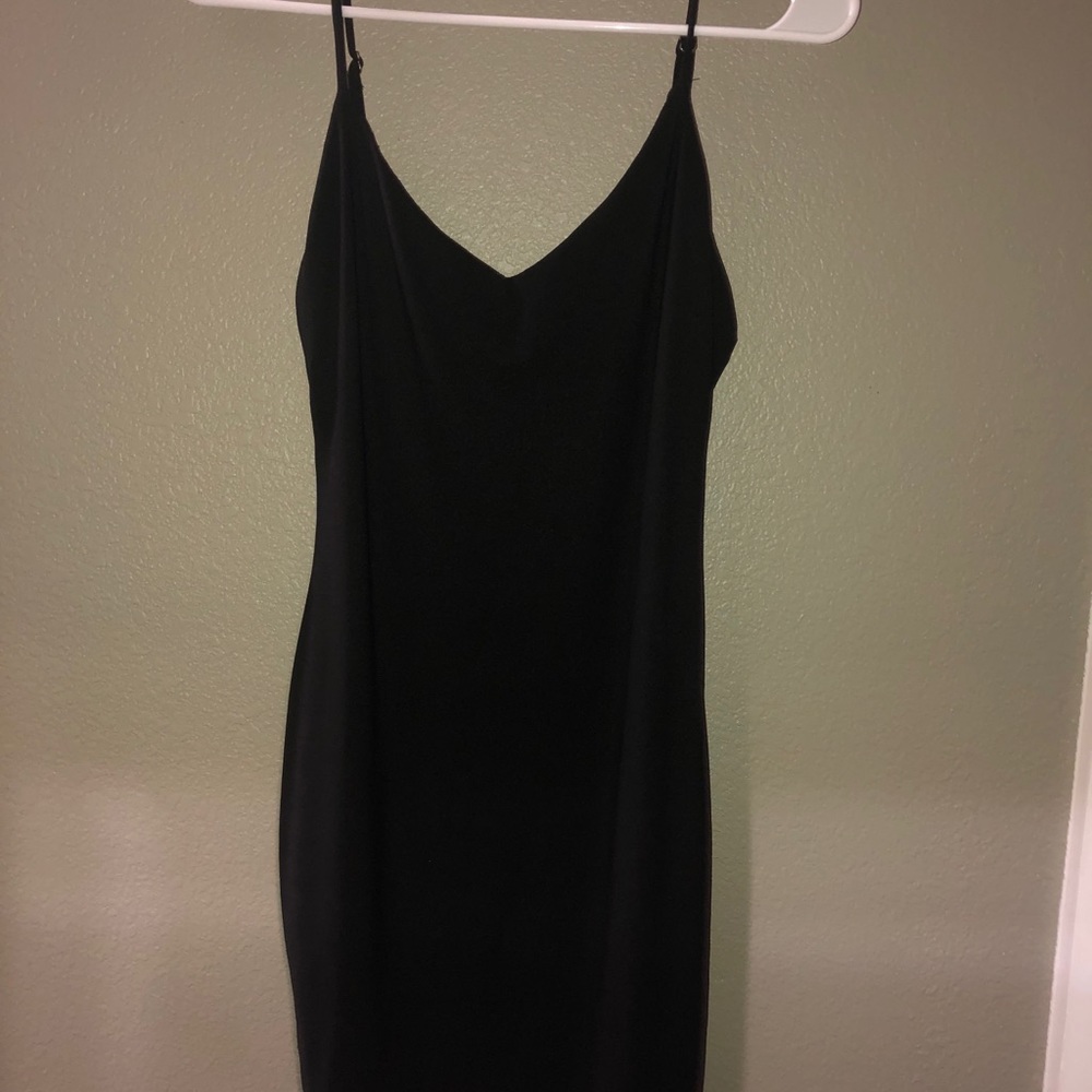 Beautifully slimming black dress